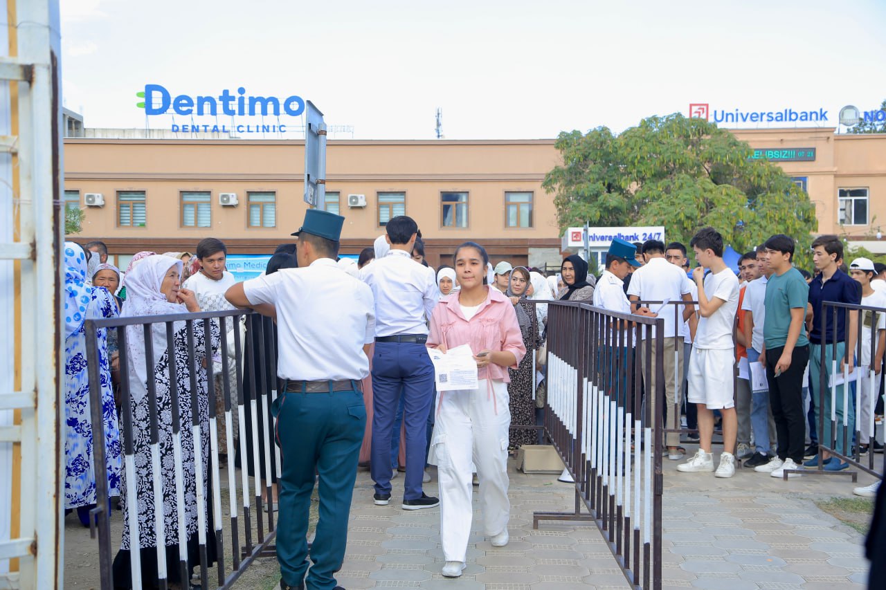 Photographs of the applicants entering for testing.